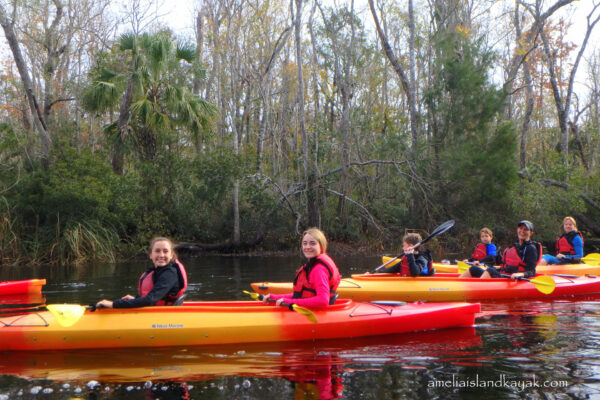 Family kayaking on Amelia Island