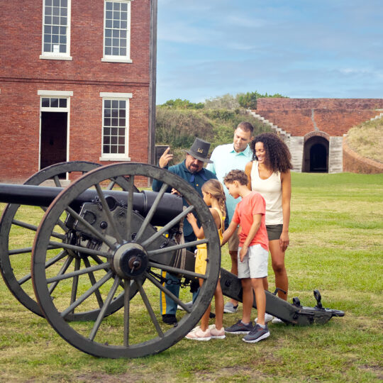 family at Fort Clinch cannon