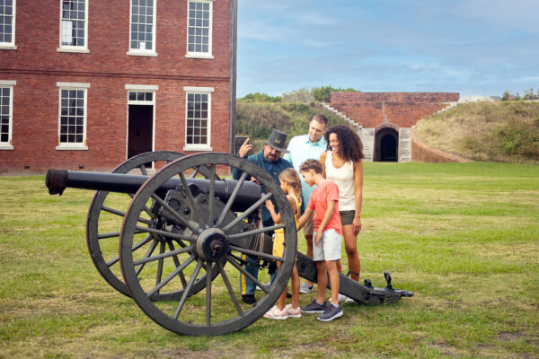 family at Fort Clinch cannon