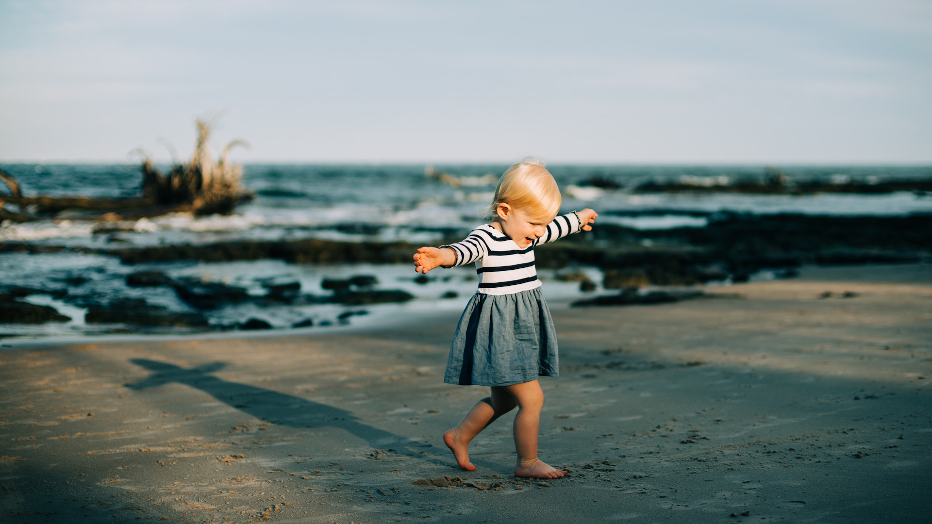 Child on Amelia Island beach, shot by Page Teahan Photography