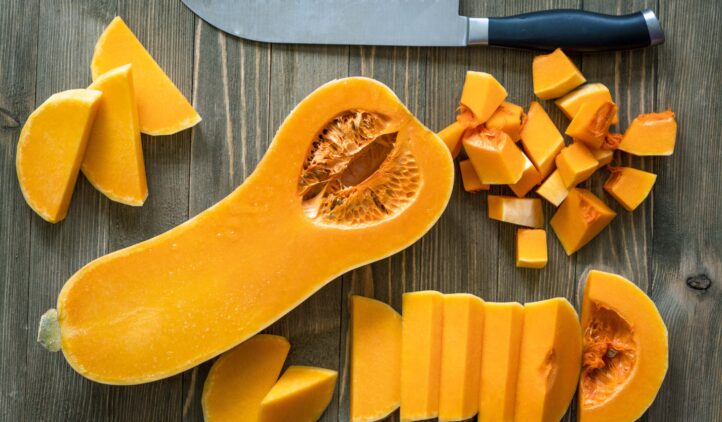 Butternut squash on a rustic wooden surface