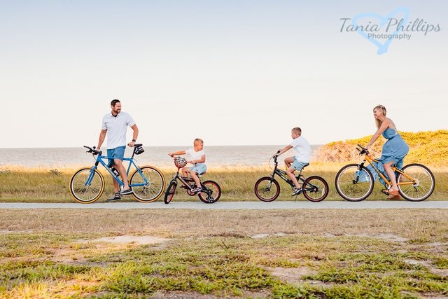 family riding bikes